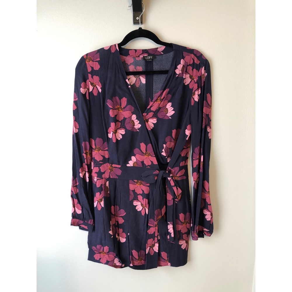 Navy romper with pink floral detail